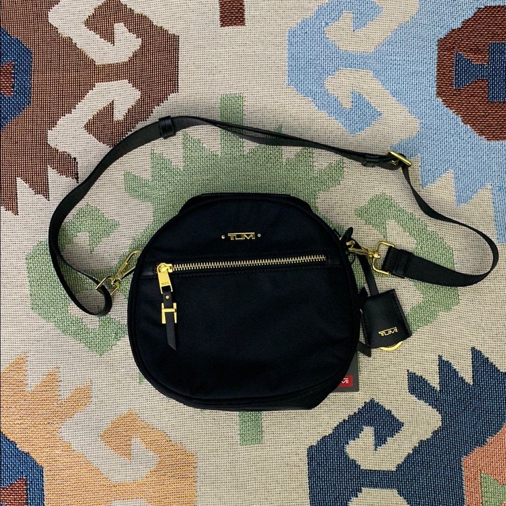 Tumi Black Crossbody Bag with Gold Accents